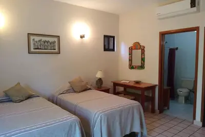 Image de Chambre spacieuse dans une maison d'hôtes familiale à quelques pas de la plage de La Ropa