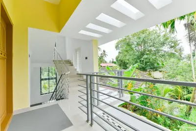 Image de Luxueuse maison 2-Bhk au milieu d'une végétation luxuriante et dans une atmosphère de village.