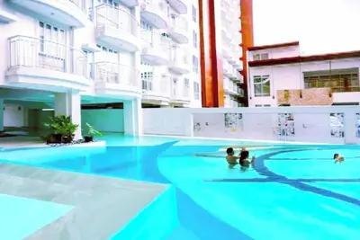 Image de D-J ♣ 1br ❤️ PinayLove ★ Piscine gratuite, Parking, Netflix, Wifi