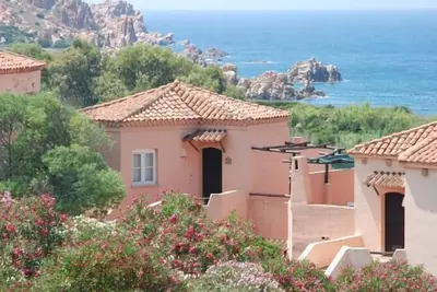 Image de appartement dans villa face à la mer terrasse au coucher du soleil