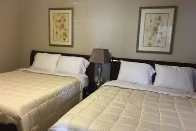 Image de Condo exécutif 2 chambres / 2 salles de bain dans les bois