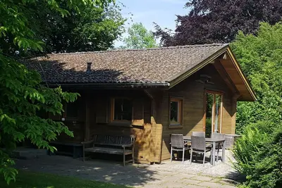 Image de Ferienhaus Ströh - cabane en rondins confortable sur l'historique Dreiseithof