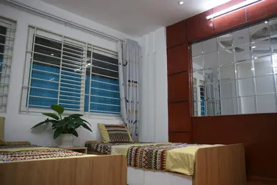 Image de Suite familiale au cœur de Hanoi avec cuisine complète et jardin - Home Beyond House Ii