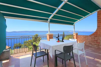 Image de Appartement de deux chambres avec la terrasse et la vue sur le mer Pisak, Omis (A-16239-c)