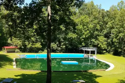 Image de Escapade estivale cool, profitez de 2 étangs privés, des montagnes à proximité, d'une voiturette de golf.