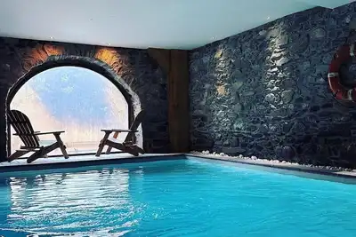 Image de Eté/Hiver Maison d'architecte  piscine intérieure  Orelle/ 3Vallées