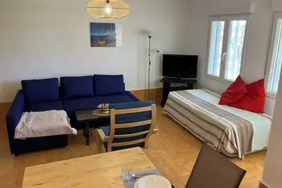 Image de Grand appartement avec jardin et piscine privée, idéal pour famille