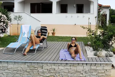 Image de Maison de vacances avec balcon, terrasse couverte et piscine privée