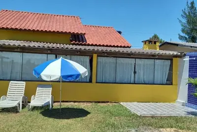 Image de Belle maison de plage à Torres à 700 mètres de la plage.