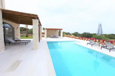 Image de Pierre naturelle - Villa Lemoni avec une vue fantastique et piscine