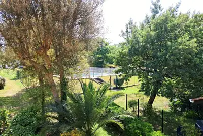 Image de Grand T2 Idéal Famille dans Parc avec Piscine, Parking privé, Plage à 5 mns