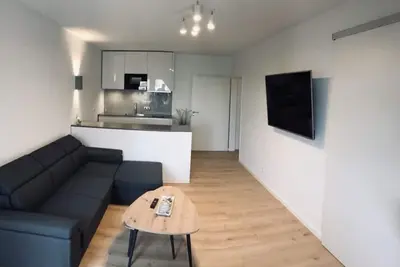 Image de Appartmenthaus dune apartment 18, non-fumeur, vue partielle sur le lac, accessible par fauteuil roulant, ascenseur