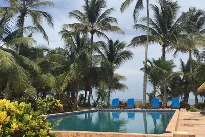 Rabais d'été à la Villa Sunrise Caye - Envoyez vos dates et nous ferons de notre mieux