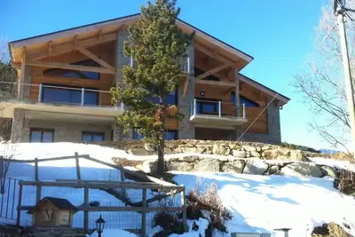 Image de Grand chalet avec jaccuzzi à 100m des pistes