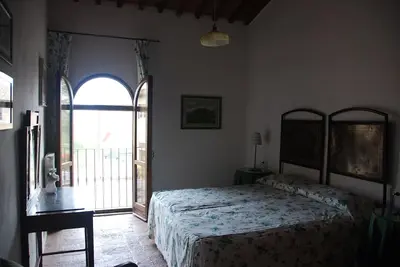 Image de Bel appartement dans une maison de vacances avec piscine, Wifi, patio, près de San Gimignano