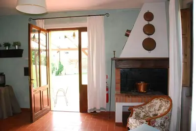 Image de Joli appartement dans une maison de vacances avec Wifi, piscine, patio, près de San Gimignano