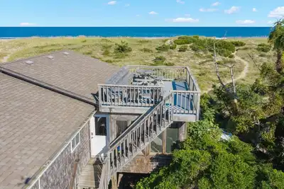 Image de Charmant Cottage Oceanfront à Avon! Belle vue, Dog-Friendly, à pied de la plage