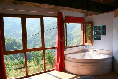 Image de Endroit romantique avec jacuzzi, Vues fantastics de montagne et cheminée