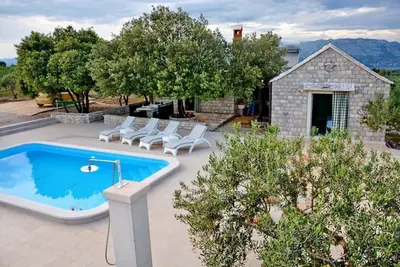 Image de Maison de vacances Pučišća pour 1 - 6 personnes avec 2 chambres à coucher - Maison de vacances