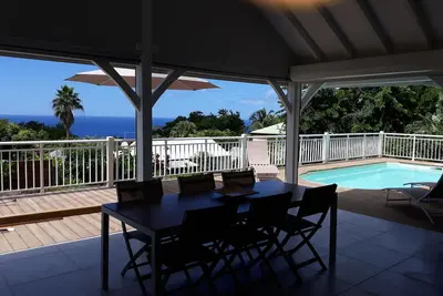 Image de La Villa Tropicale, calme, vue sur mer et ilets Pigeon, piscine au sel