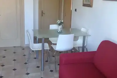Image de Bel appartement de trois pièces avec une véranda à Torre dell'Orso
