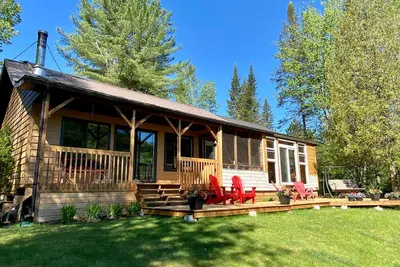 Image de Le Huard - Chalet 4 saisons au bord du lac, 8 pers, plage privée