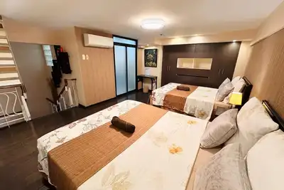 Image de Super Loft Cebu avec vue sur la mer. Une location de maison familiale.