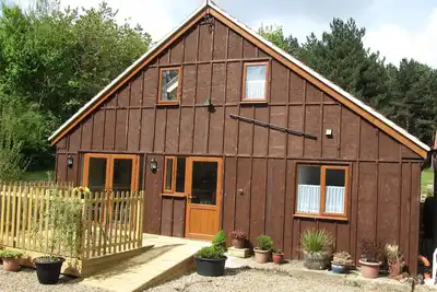 Image de Cottage Deerewood - Situé autour d'une ancienne ferme dans un village