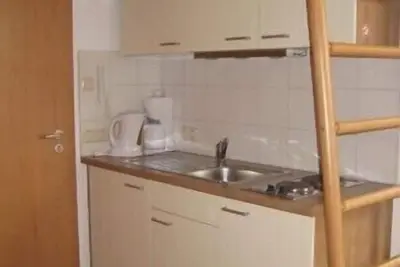 Image de Appartement \"Holzknecht\" 24 qm Dusche/Wc, bis 4 Personen, Küchenteil, Wohn/Schlafraum kombiniert, Nichtraucher, 3 Sterne