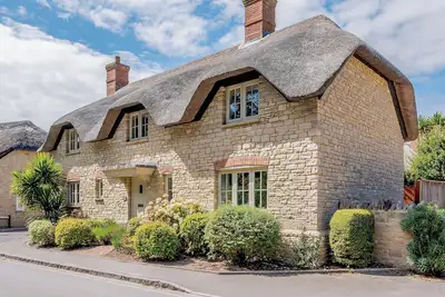 Image de 4 chambres à coucher à West Lulworth
