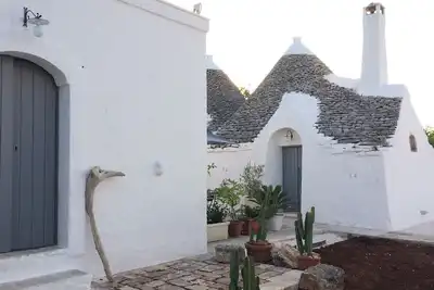 Image de Trullo indépendant dans un village de trullo