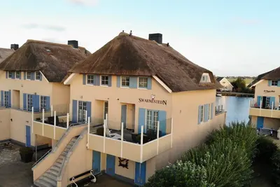 Image de Belle villa en bateau avec propre bateau et vélo Stavoren ✅ prise pour voiture électrique