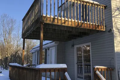 Image de À quelques minutes de la plage, du club-house et des stations de ski!