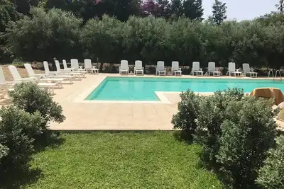 Image de Appartement avec piscine, 2 chambres au bord de la Mer, Wi-Fi, A/C, Terrasse