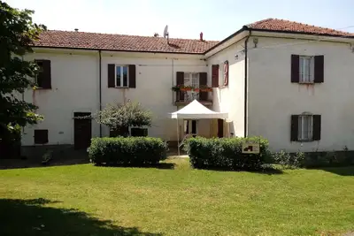 Image de Casa Del Prato Ferme entourée de verdure