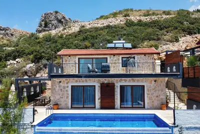 Image de Elvin. Villa En Pierre Avec La Meilleure Vue De Kalkan!