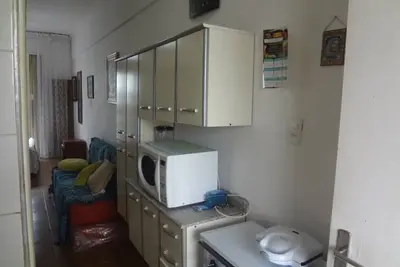 Image de kitnet avec air conditionné à Pitangueiras.