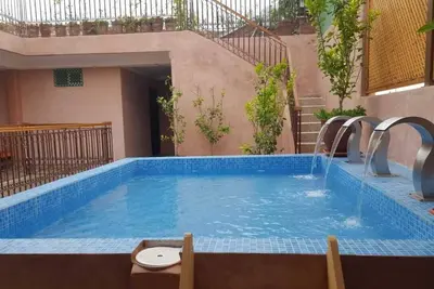Image de Chambre double ou lits jumeaux avec piscine sur le toit à Marrakech