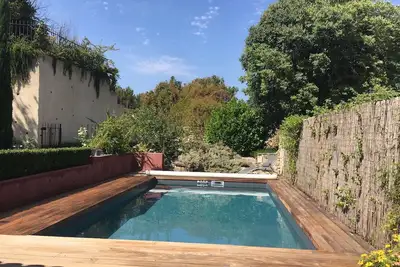 Image de Maison avec piscine et grand jardin au cœur du village