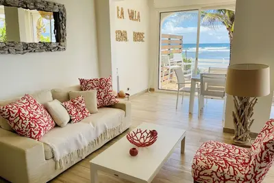 Image de Corail rouge, les pieds dans le sable