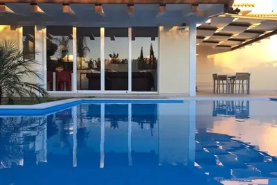 Image de Appartement de 90 m² dans villa avec piscine individuelle et jardin