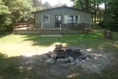 Image de Pine Point - Cabane 2 chambres au bord de l'eau rustique