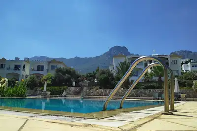 Image de Village de Bufavento avec vue sur la mer et la montagne avec une superbe piscine.