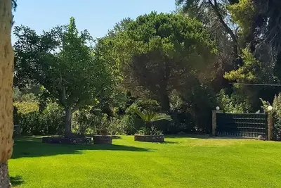 Image de Une maison de jardin Ă quelques pas de la plage!