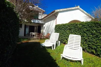 Image de N107 - Numana, large three-room apartment with garden and two bathrooms