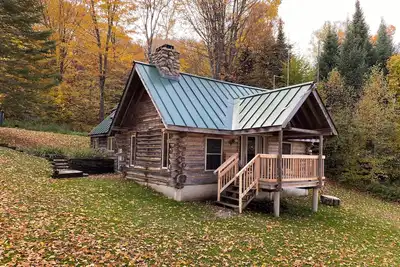 Image de Rustique et authentique hors réseau Log Cabin 15 minutes de Kingdom Trails