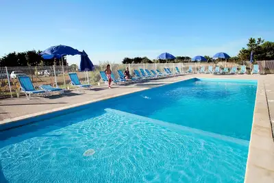 Image de Appart cosy et sympa avec Wi-Fi Gratuit, à 15 minutes de la plage!