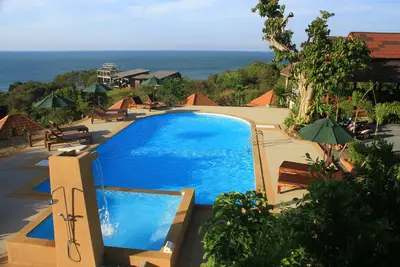 Image de Villa avec vue sur la mer, une chambre à coucher