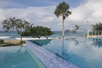 Image de Condo 3 chambres sur plage de sable privée, piscine à débordement, jacuzzi!