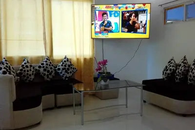 Image de Maison privée avec wifi gratuit + netflix Room1